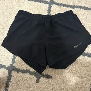 Black womens nike dri fit shorts.  Size small